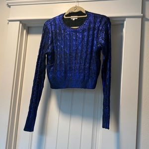 Zarina Crew Neck Sweater in Blue Metallic
superdown
Color:Blue Metallic